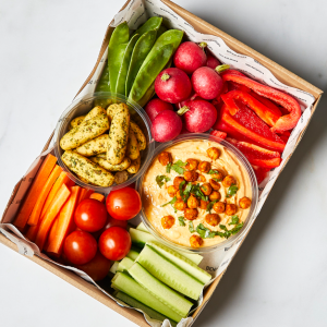 Vibrant vegan crudités box platters for healthy corporate office catering in Stockley Park.