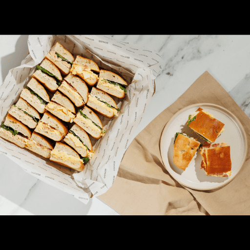 Gourmet 18-piece artisan breakfast focaccia sandwich platter by UR. café for corporate catering in Stockley Park.