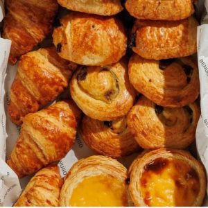 Gourmet 16-piece selection of freshly baked mini artisan pastries by UR. café for corporate catering in Stockley Park.